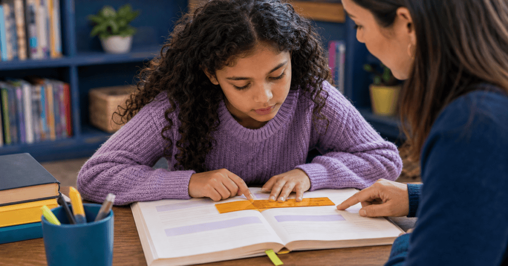 Young girl receiving speech therapy from a professional at Arbutus Speech Therapy.